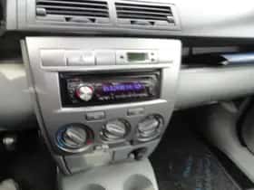 Mazda 2 (2003) thumbnail 14