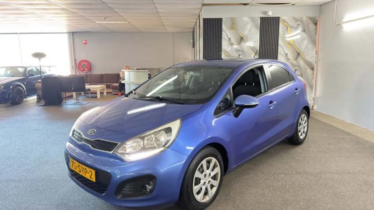 Kia Rio (2011) — foto 1