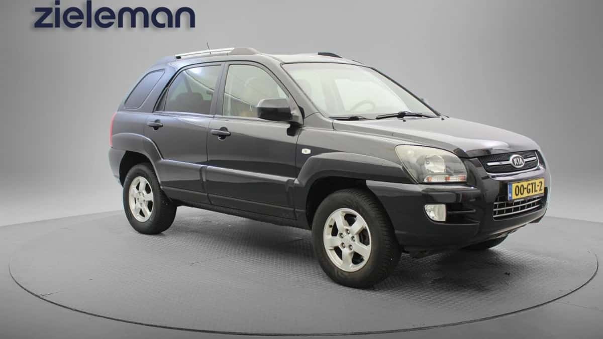 Kia Sportage (2009) — foto 1