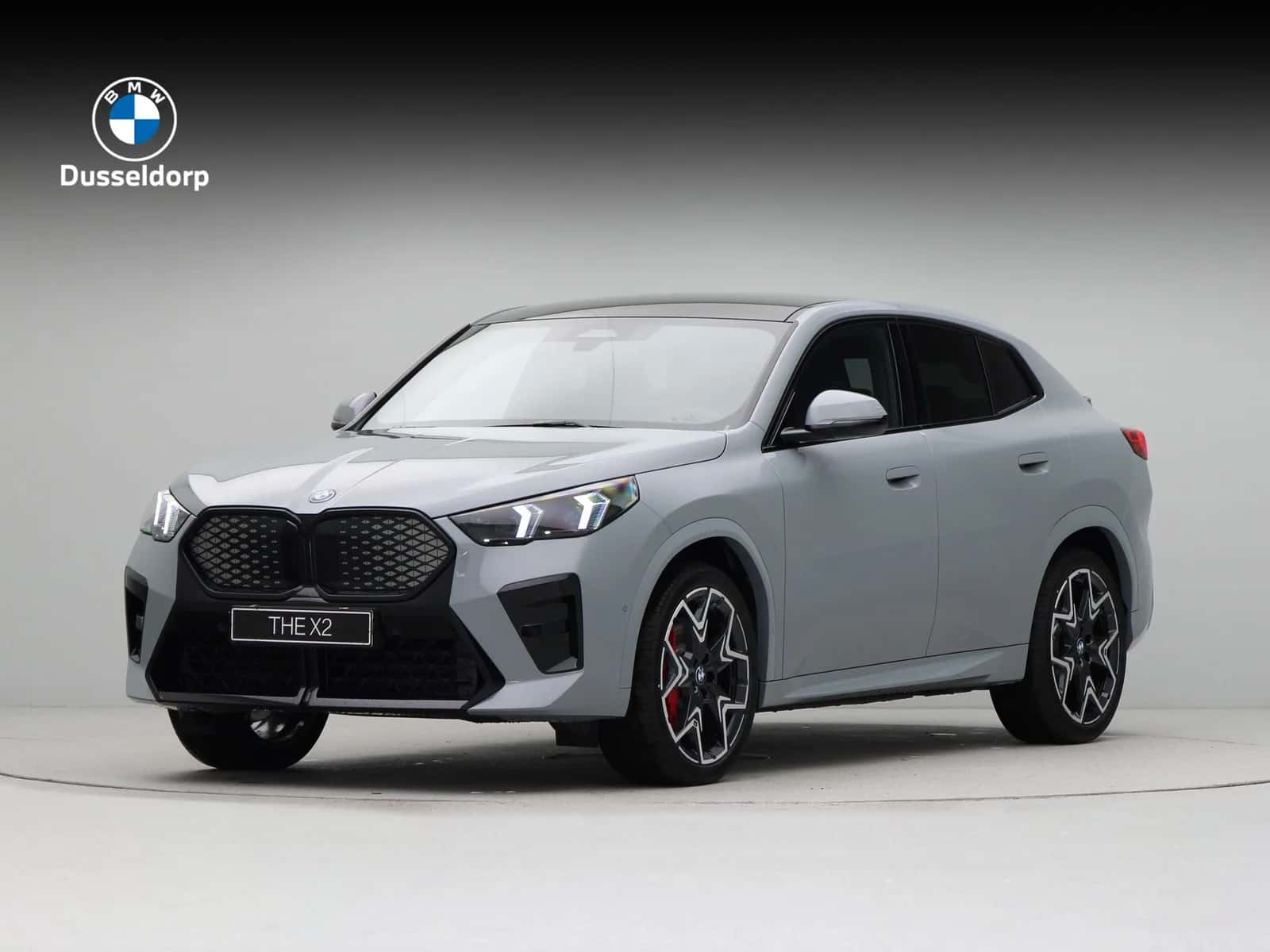 BMW iX2 (2026) — foto 1