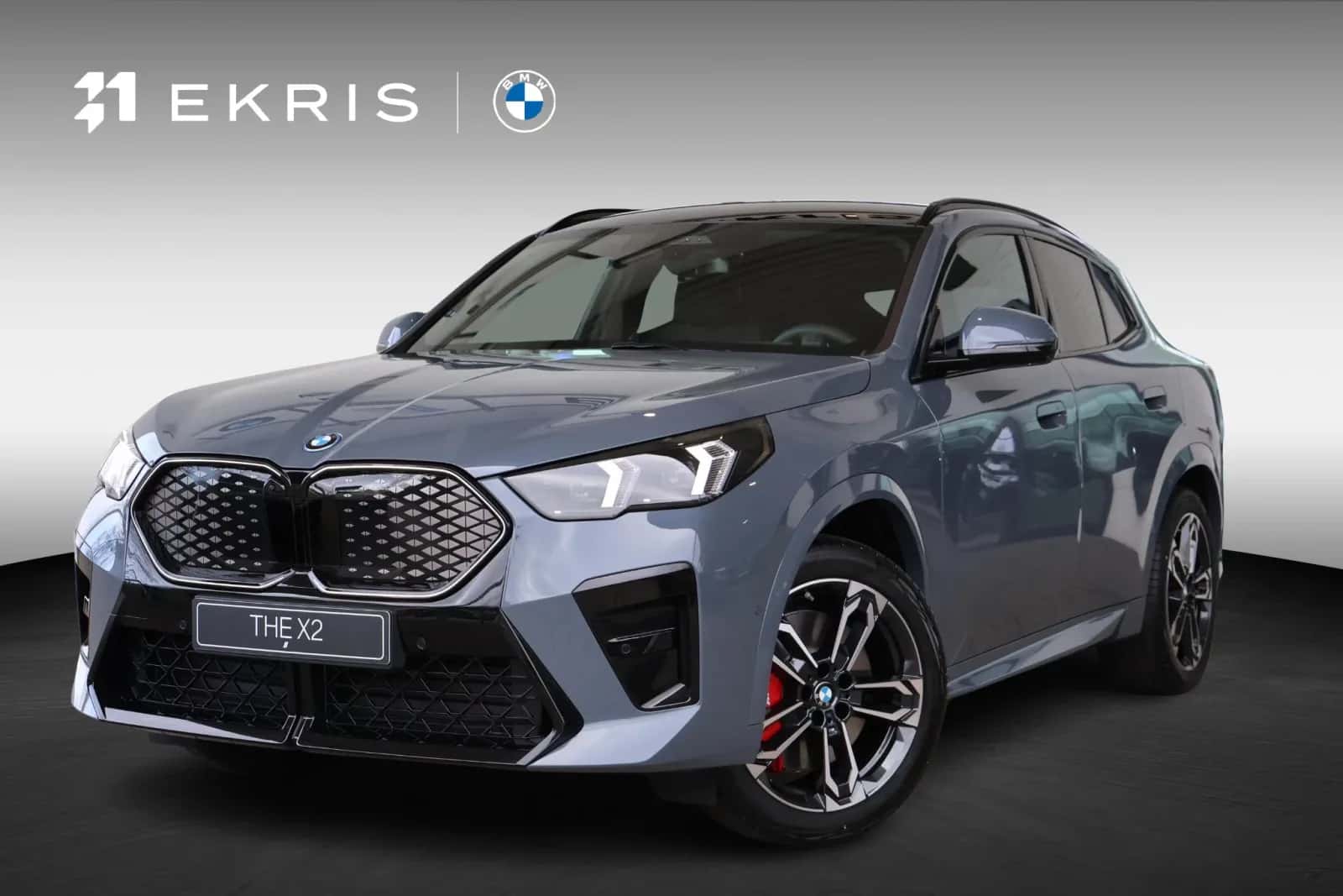 BMW iX2 (2026) — foto 1
