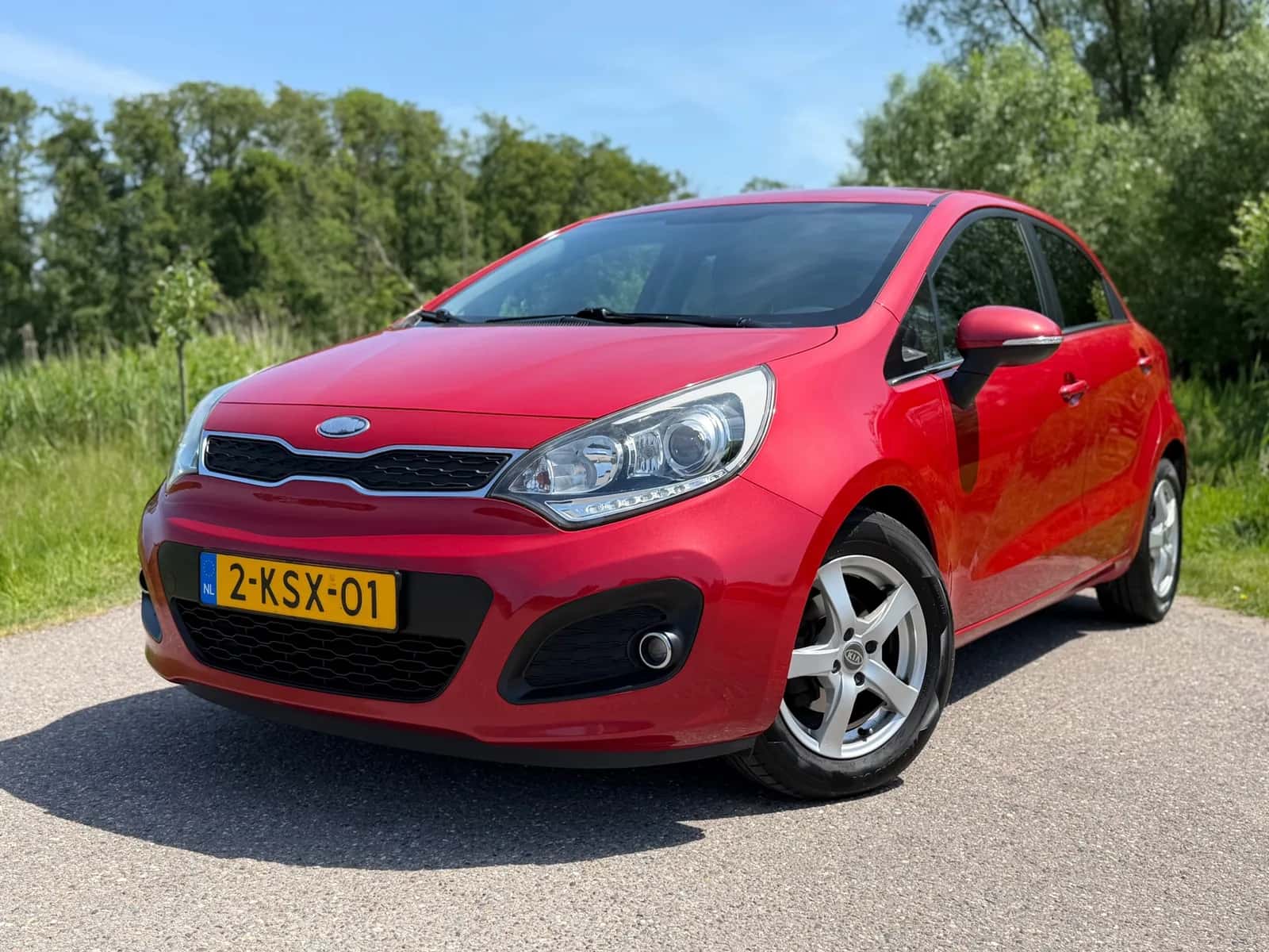 Kia Rio (2013) — foto 1
