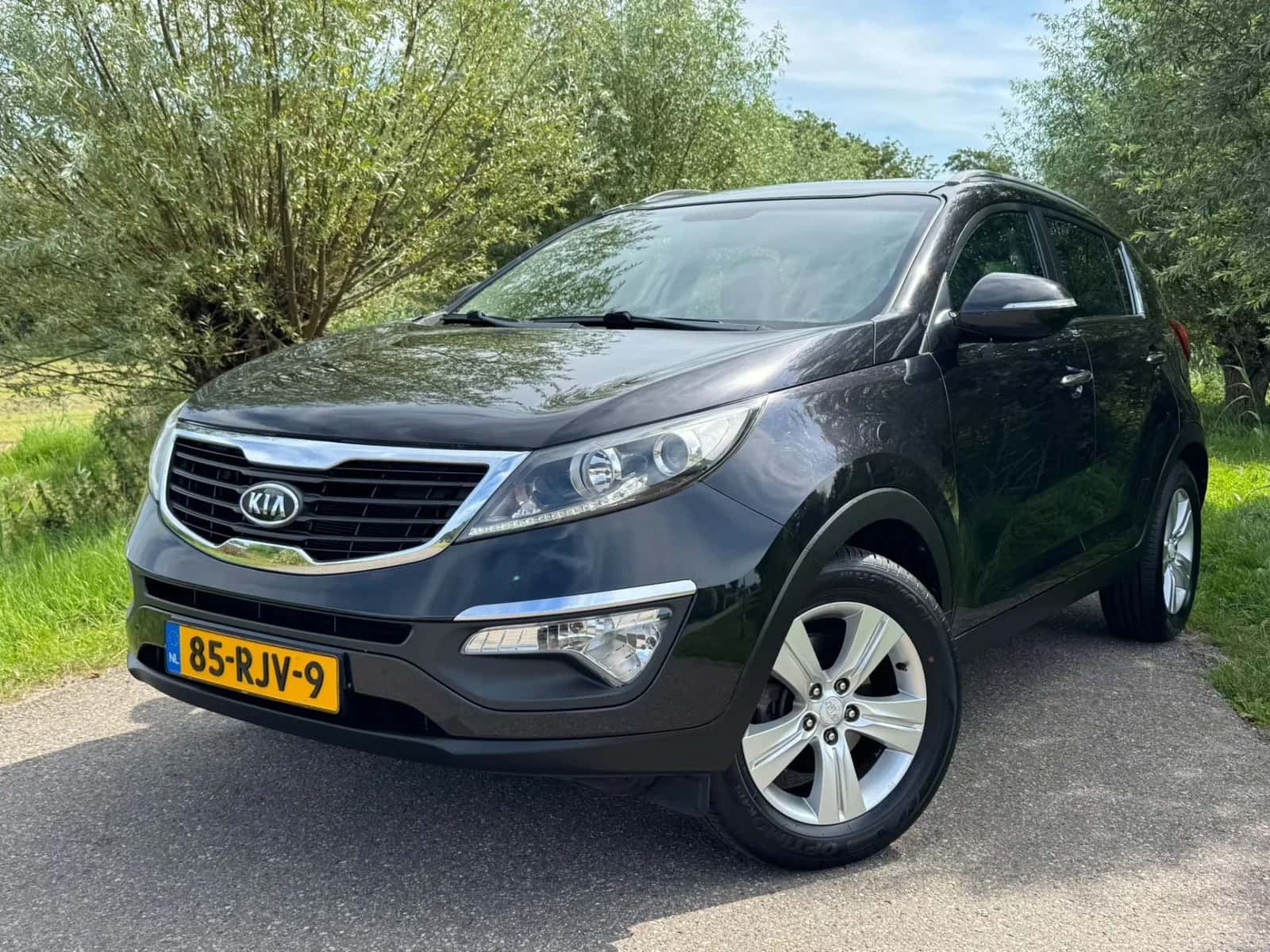 Kia Sportage (2011) — foto 1