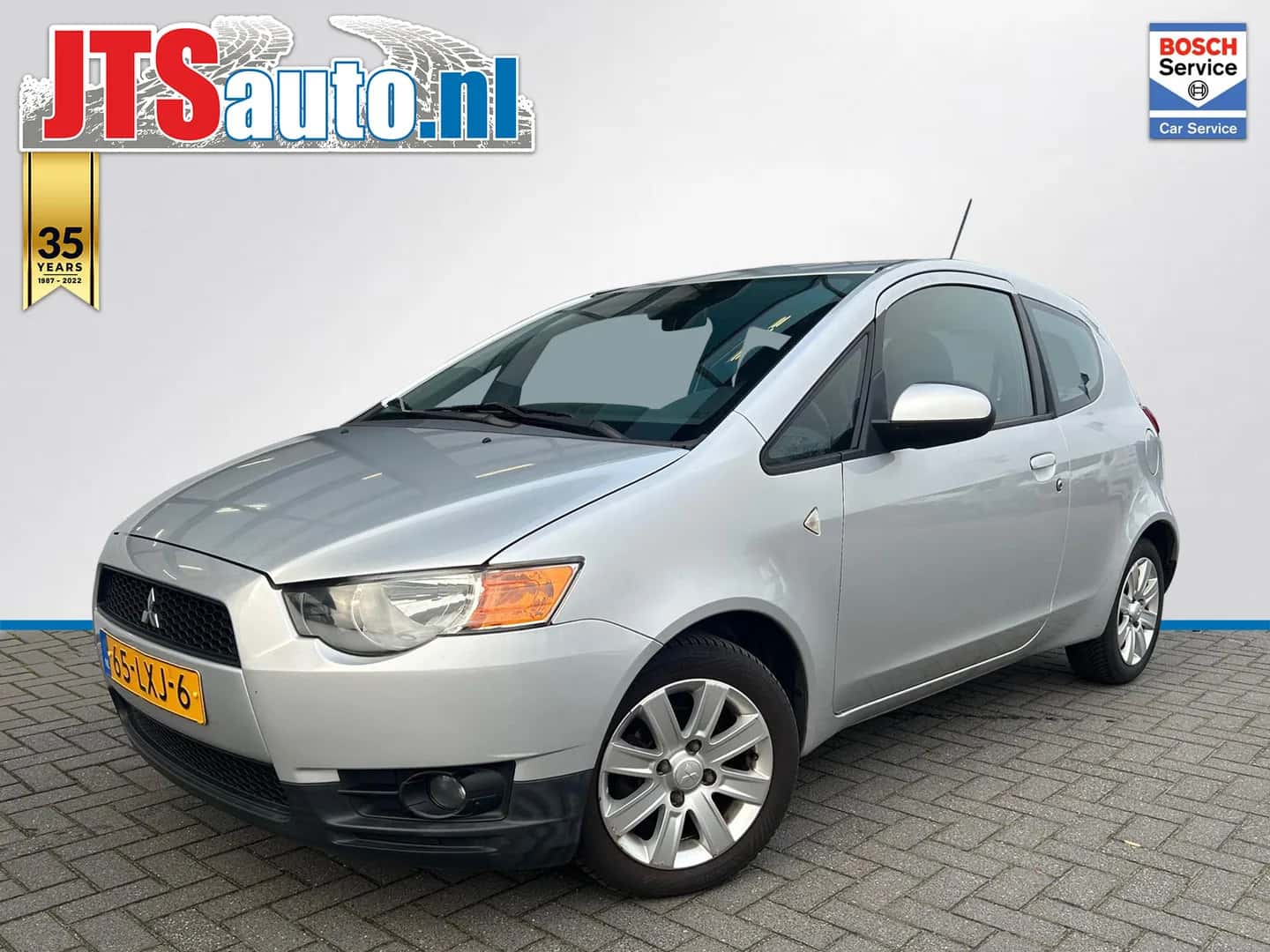 Mitsubishi Colt (2010) — foto 1