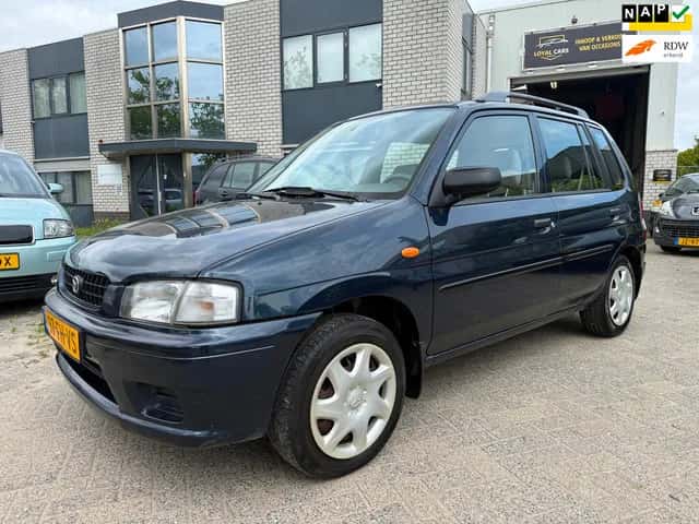 Mazda Demio (2000) — foto 1