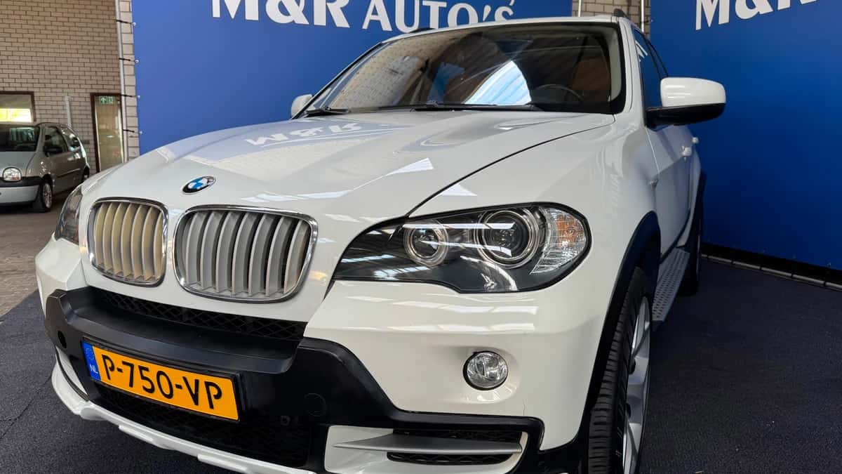BMW X5 (2009) — foto 1