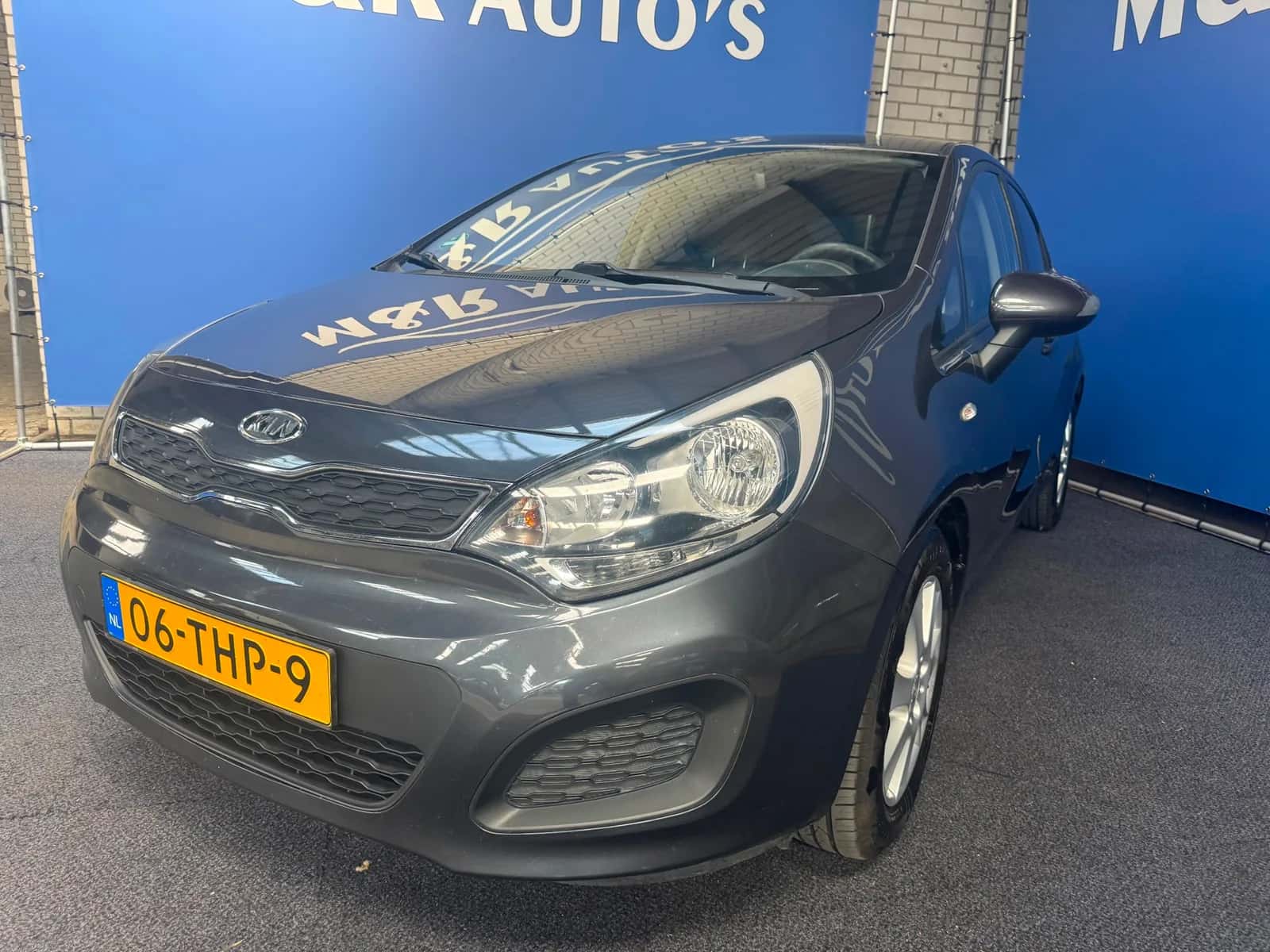 Kia Rio (2012) — foto 1