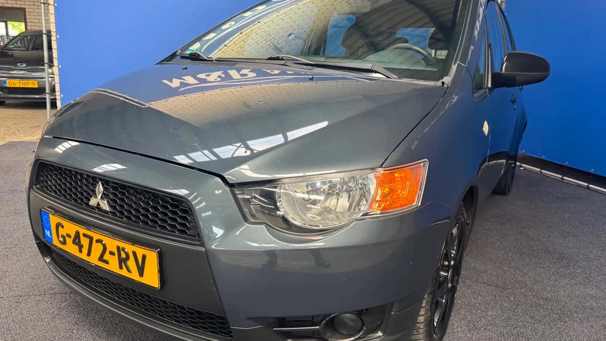 Mitsubishi Colt (2009) — foto 1
