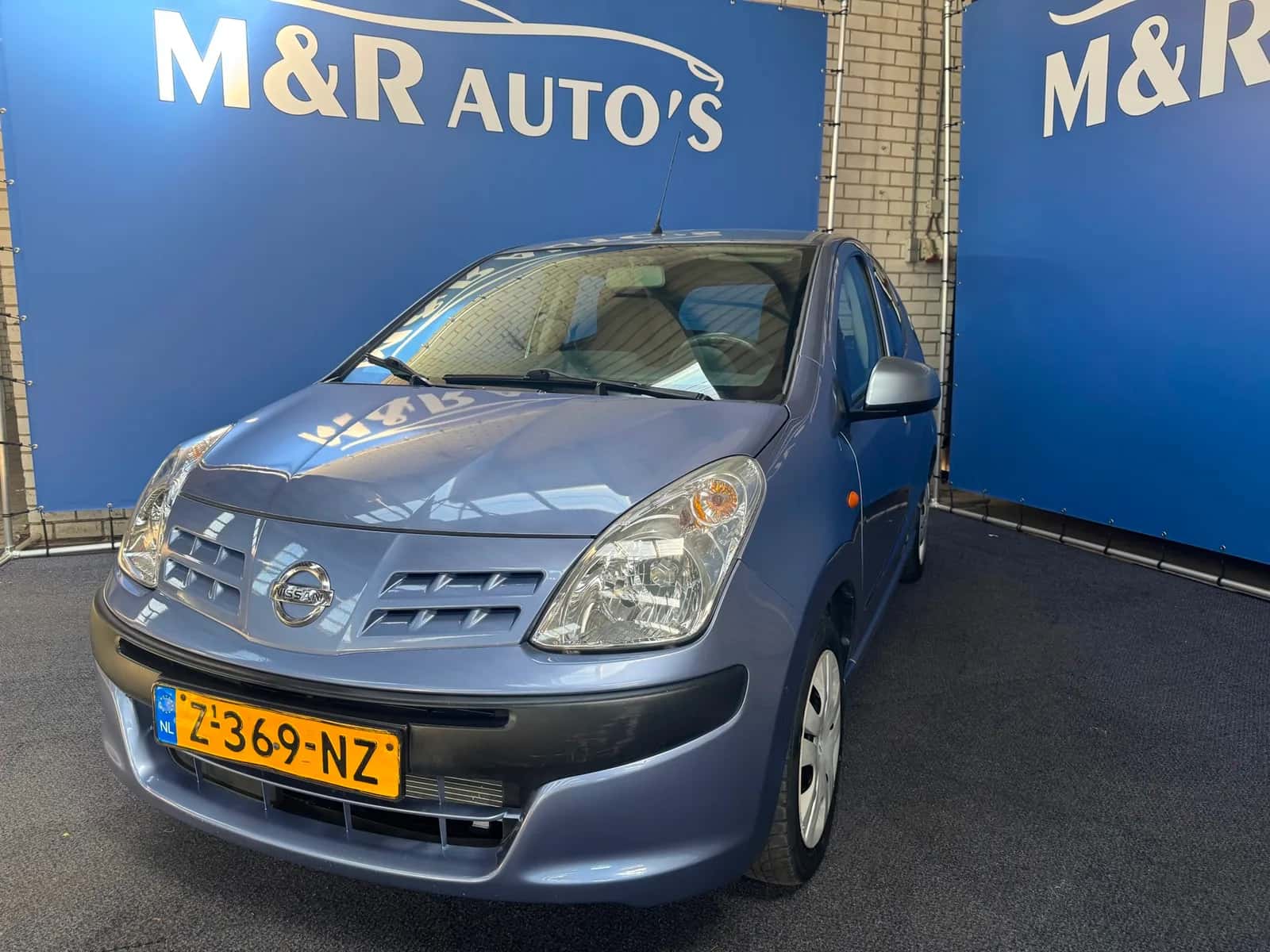 Nissan PIXO (2009) — foto 1