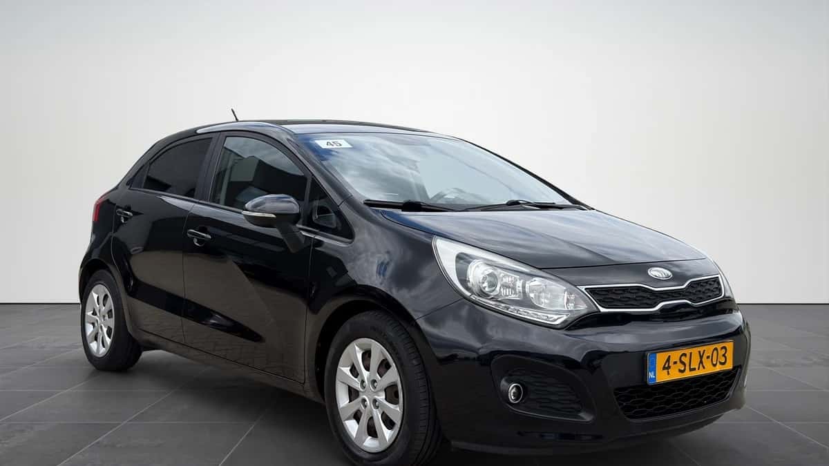 Kia Rio (2013) — foto 1