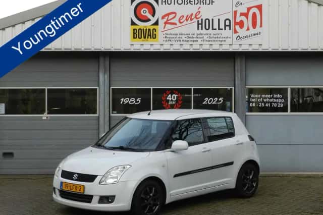 Suzuki Swift (2010) thumbnail 1