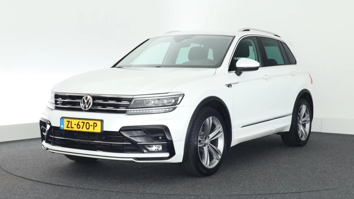 Volkswagen Tiguan 1.4 TSI 150pk DSG R-Line Highline Trekhaak Stoelverwarming Keyless Virtual Cockpit Navigatie — foto 1