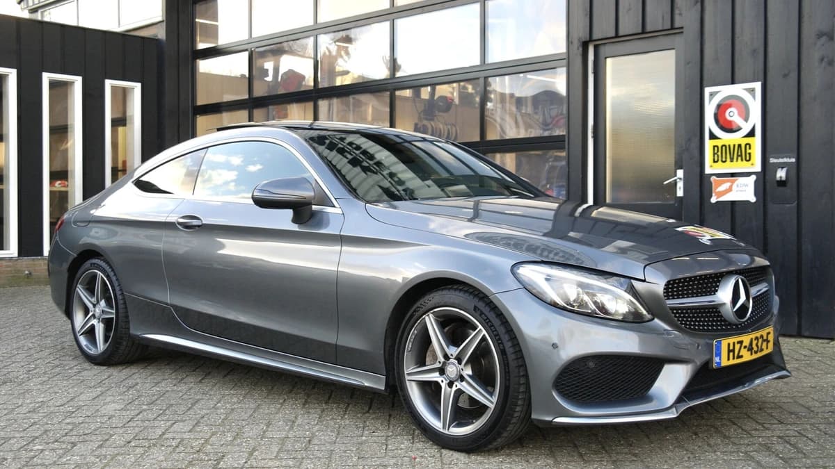 Mercedes-Benz C-Klasse Coupé 180 Ambition AMG Automaat — foto 1