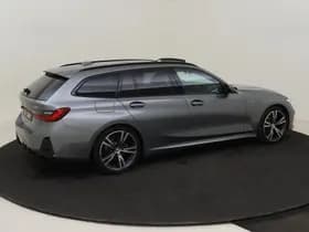 BMW 3 Serie Touring 318i M Sport / Pano / 19 inch / Adap. Cruise / Géén Afleverkost thumbnail 5