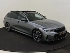 BMW 3 Serie Touring 318i M Sport / Pano / 19 inch / Adap. Cruise / Géén Afleverkost thumbnail 7