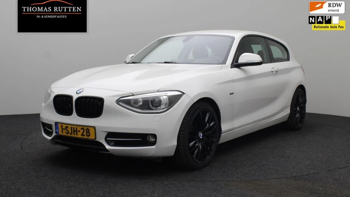 BMW 1-serie 114i EDE Executive — foto 1
