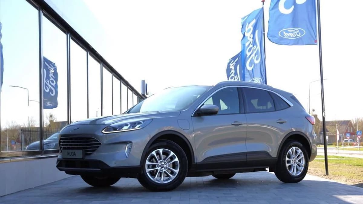 Ford Kuga 2.5 PHEV e-CVT 225pk Titanium X I Trekhaak I All season Solar Silver — foto 1