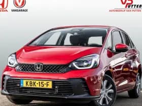 Honda Jazz 1.5 Full Hybrid Elegance Automaat | 8 jaar garantie | Premium Crystal Red Metallic | Stoelverwarming | Navigatie | Adaptieve cru