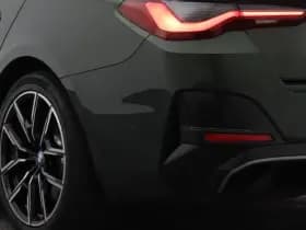 BMW I4 m50 high executive m sport 84 kwh 360 adaptive hud memory stoelverwarming thumbnail 19