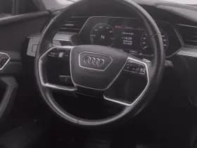 Audi E-tron tron 50 quattro business edition plus 71 kwh pano camera luchtvering stoelverwarming thumbnail 8