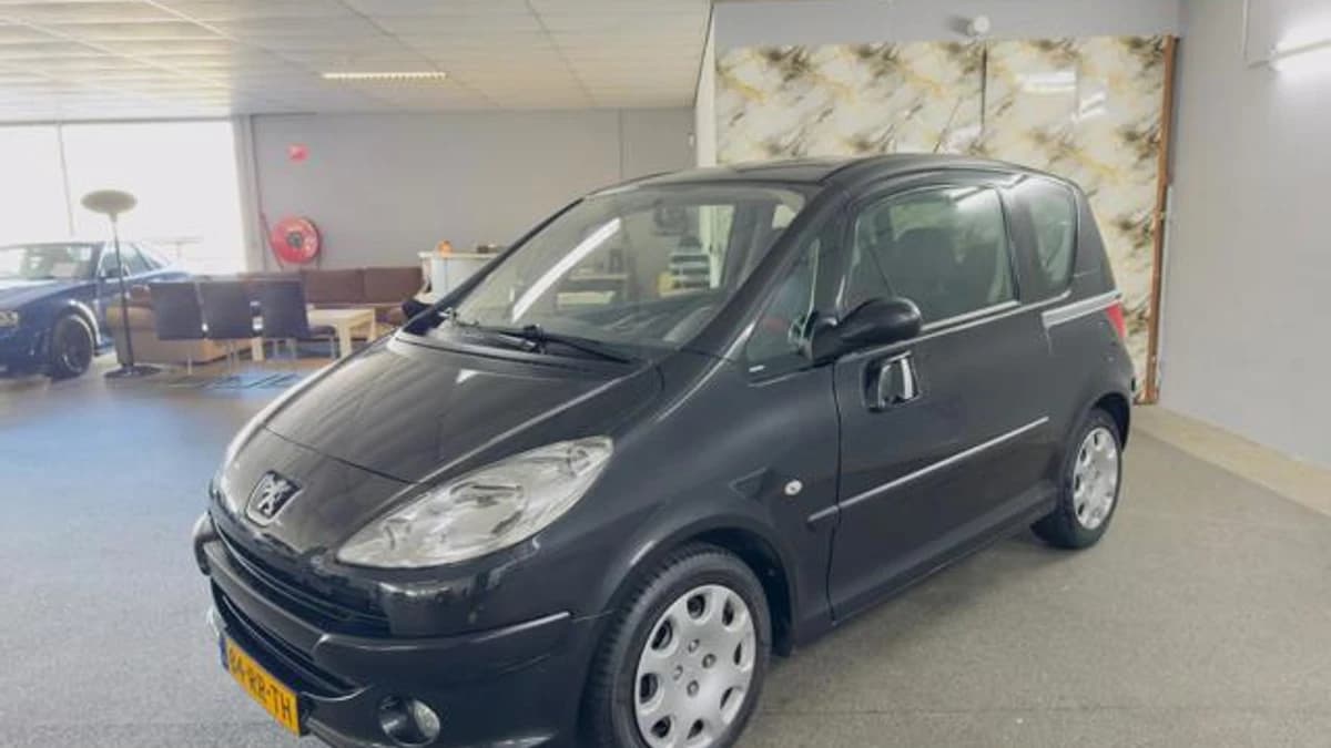 Peugeot 1007 — foto 1