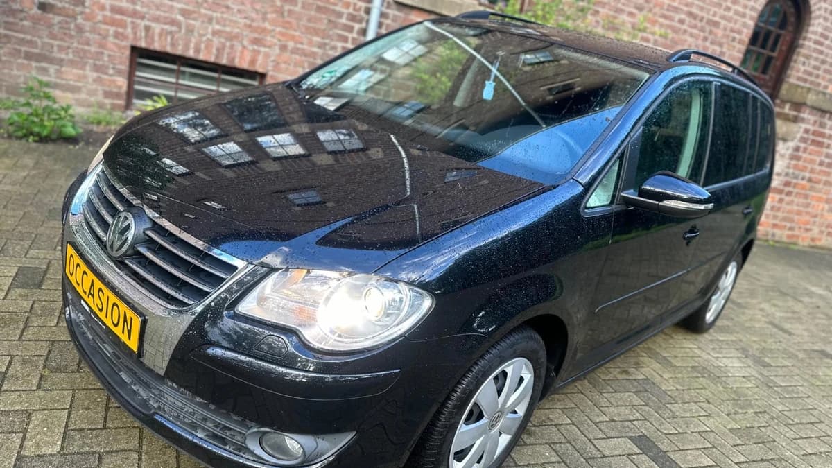 Volkswagen Touran — foto 1