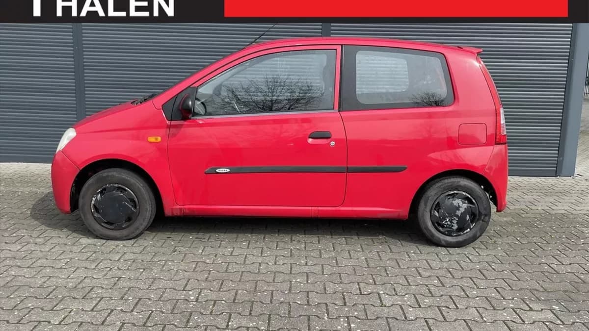 DAIHATSU Cuore — foto 1