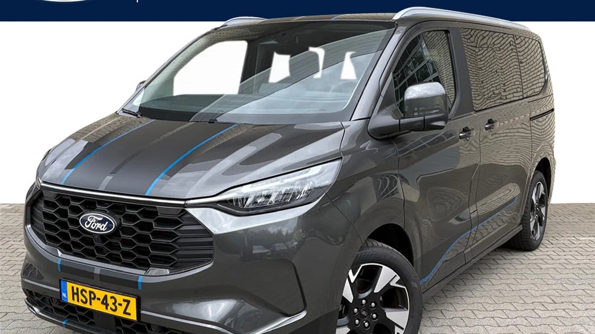 Ford Tourneo Custom PHEV 233PK L1 Sport | Geel kenteken | Incl. BPM & BTW | 8 Persoons | Panoramadak | Inklapbare trekhaak | 1.850kg trekgw. — foto 1