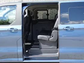 Ford Tourneo Custom 2.5 Plug-IN Hybrid 233 PK L2H1 Titanium X | Incl. BTW & BPM | 8 Persoons | Elektr. Schuifdeuren | Digitale binnenspiegel | Trekhaak wegkl. | Leer | B&O | Adaptive Cruise C. | thumbnail 6