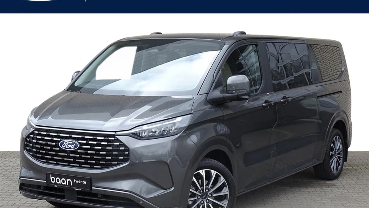 Ford Tourneo Custom 2.5 Plug-IN Hybrid 233 PK L2H1 Titanium X | Incl. BTW & BPM | 8 Persoons | Full Led Koplampen | Trekhaak Wegklapbaar | Blis | Adaptieve Cruise. | Elek. Schuifdeuren | Volledig Leder | Camera | Uit Voorraad Leverbaar — foto 1