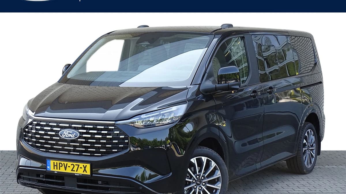 Ford Tourneo Custom 2.5 Plug-IN Hybrid 233 PK L1H1 Titanium X | Incl. BTW & BPM | 8 Persoons | Elektr. Schuifdeuren | Panorama dak | Trekhaak | Leer | B&O | Adaptive Cruise C. | — foto 1