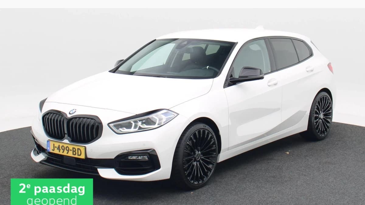 BMW 1-serie 118i 140 Pk High Executive Edition — foto 1