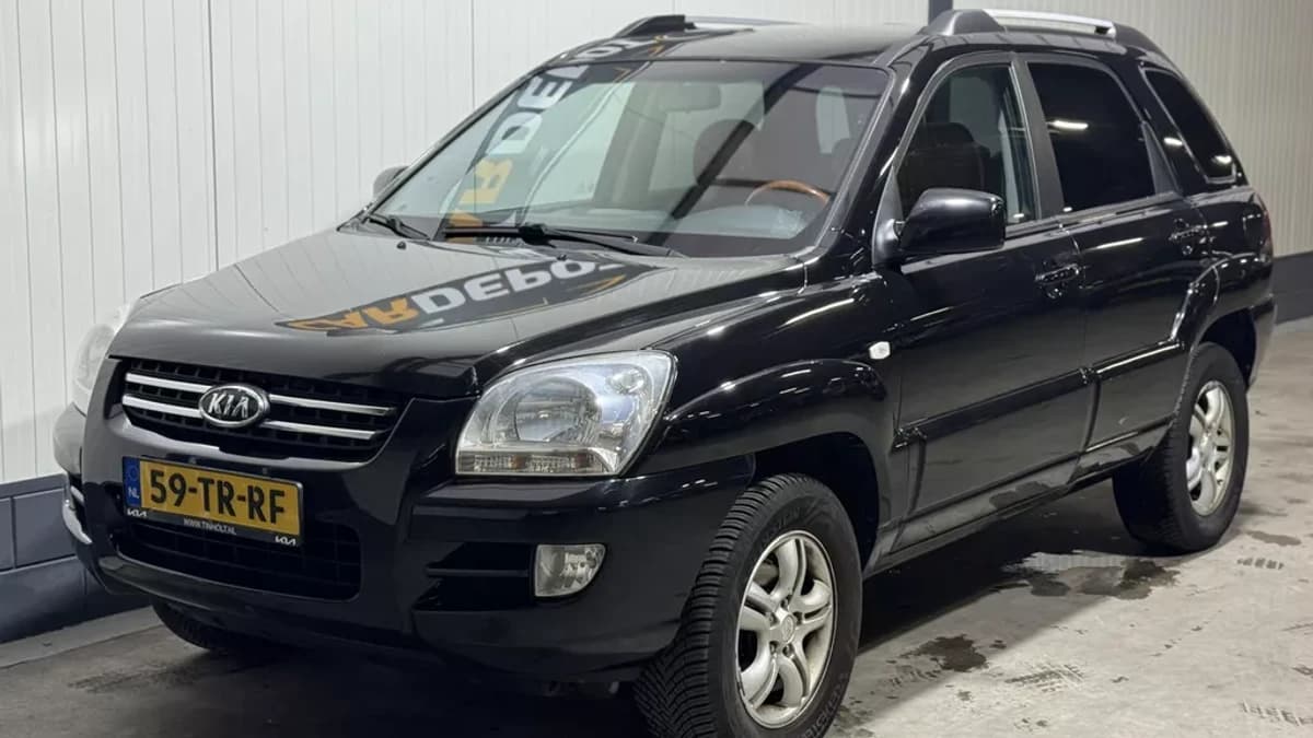 Kia Sportage — foto 1