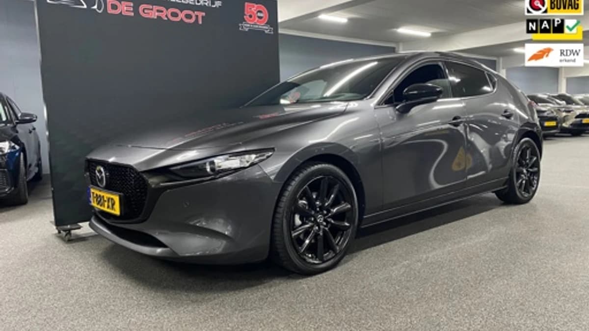 Mazda 3 — foto 1