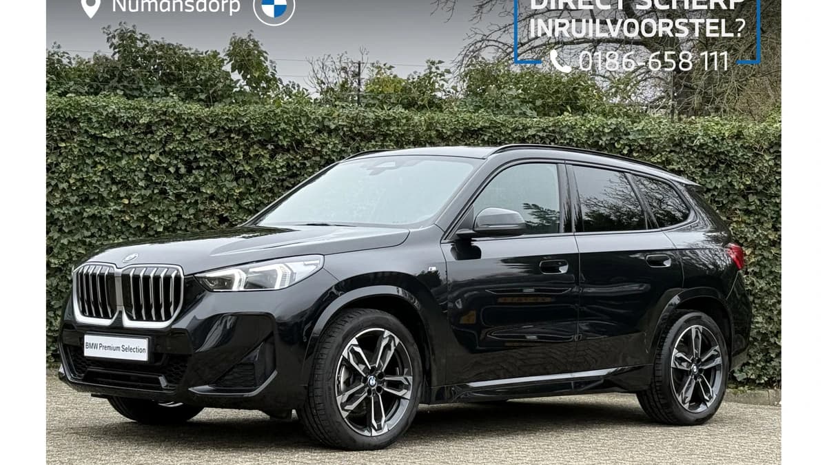 BMW X1 sDrive18i | M-Sport | Panorama | Harman/kardon | Elek. stoelverst. | Camera | Driving ass. Plus | Trekhaak — foto 1