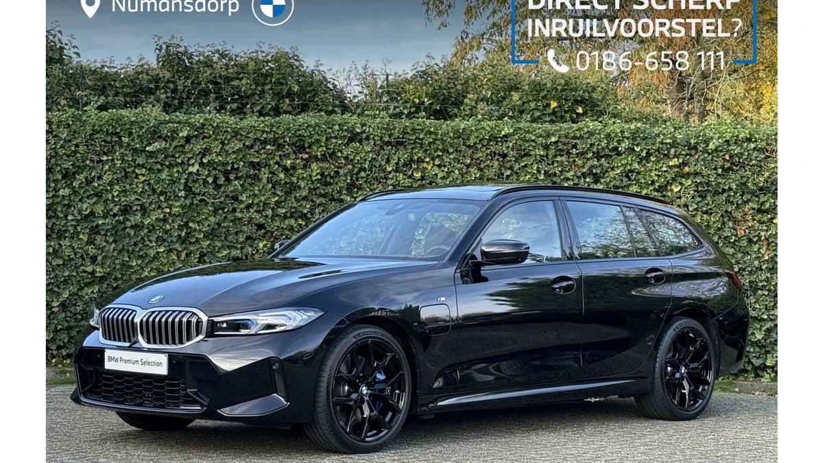 BMW 3 Serie Touring 330e M-Sport | Panorama | Trekhaak | 19" | Driving Ass. | 360 Cam | Memory Stoel — foto 1