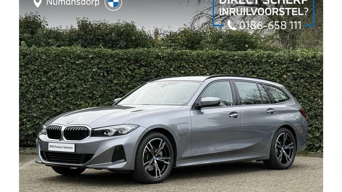 BMW 3 Serie Touring 320e | Camera | Sportstoel. | PDC voor + achter — foto 1