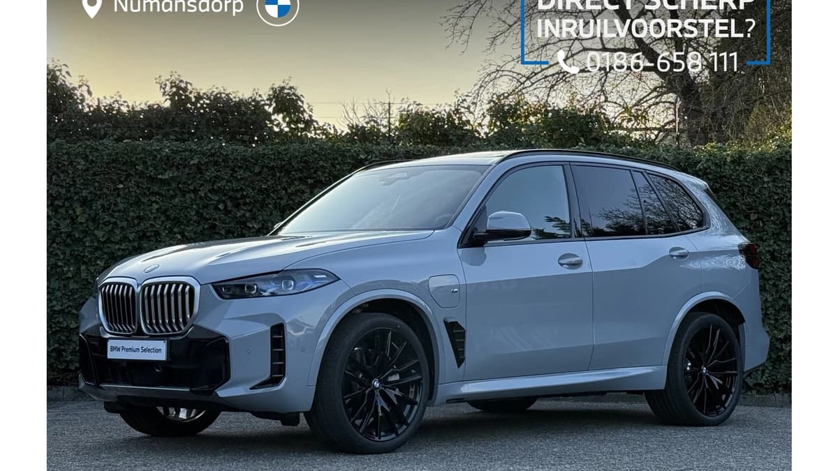 BMW X5 xDrive50e | M-Sport | 22" | Stoelverw. + ventilatie | Panorama. | Swarovski elementen | 360 cam | Comf. zetels | Trekhaak — foto 1