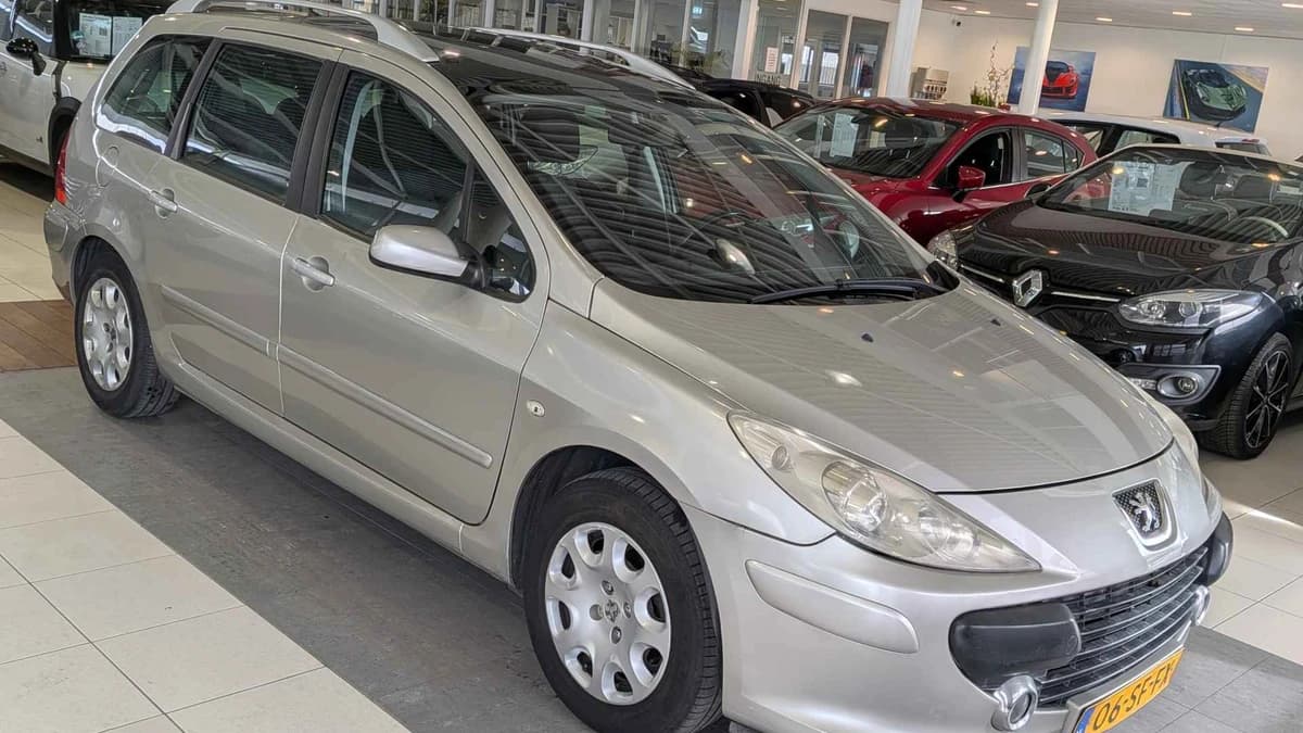 Peugeot 307 — foto 1