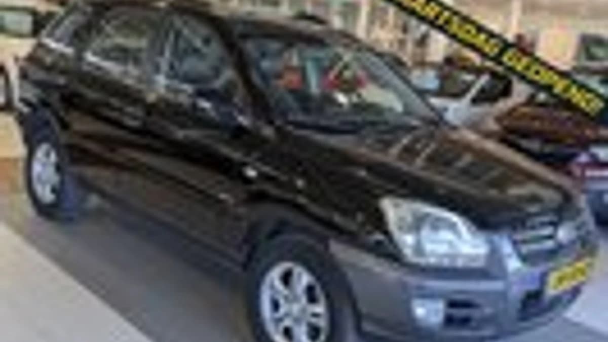 Kia Sportage — foto 1