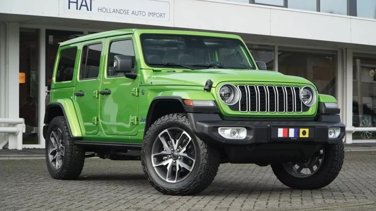 Jeep Wrangler Unlimited 4xe 380 Sahara Sky-one I 4 jaar garantie — foto 1