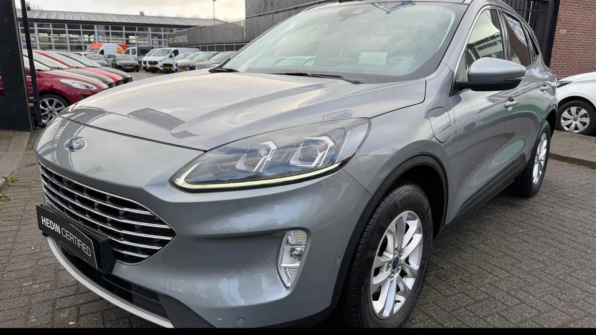 Ford Kuga 2.5 PHEV Titanium X | Panoramadak | Trekhaak wegklapbaar | Winter Pack | Driver Assistance Pack — foto 1