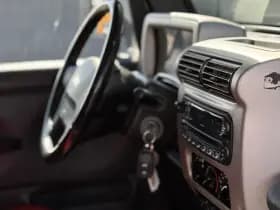 Jeep Wrangler TJ 4.0i 6-Cilinder | Hard & Softtop | Airco | Cruise Control | Navigatie thumbnail 2