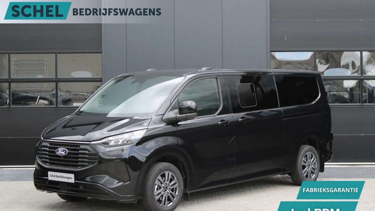 Ford Transit Custom 340 2.5 PHEV L2H1 Limited 232pk - 8 zits - Adaptive Cruise - Blind spot - Navi - Stuurverwarming - Airco achterin - Incl BPM - Rijklaar — foto 1