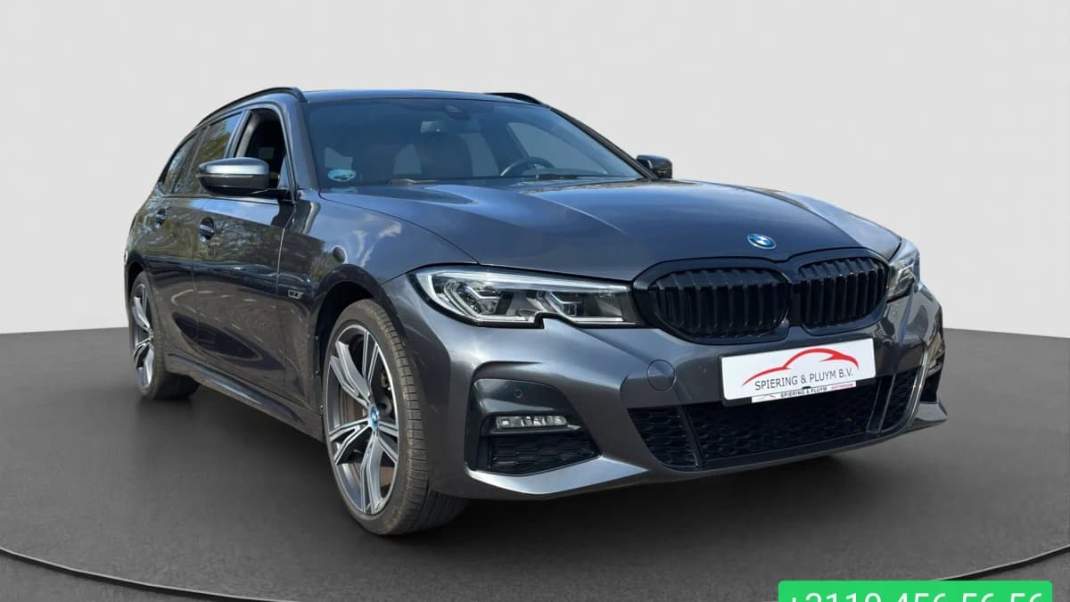 BMW 3 Serie Touring 320e High Executive M-Sport | Head-Up | 19'' | Laser LED | Half leder — foto 1