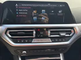 BMW 3 Serie Touring 320e High Executive M-Sport | Head-Up | 19'' | Laser LED | Half leder thumbnail 13