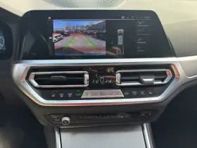 BMW 3 Serie Touring 320e High Executive M-Sport | Head-Up | 19'' | Laser LED | Half leder thumbnail 14