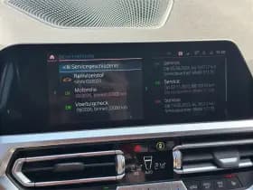 BMW 3 Serie Touring 320e High Executive M-Sport | Head-Up | 19'' | Laser LED | Half leder thumbnail 16