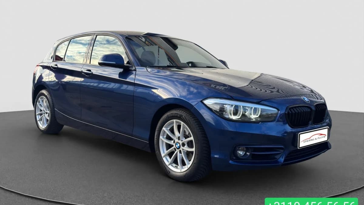 BMW 1-serie 118i Corporate Lease Executive | NL Auto | PDC | Automaat — foto 1