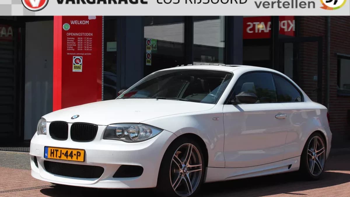 Bmw 1 Serie (E87) 135i 306pk | Handbak | Topper !! | Schuifdak | A/C | Stoelverwarming | Pdc | Leuk | — foto 1